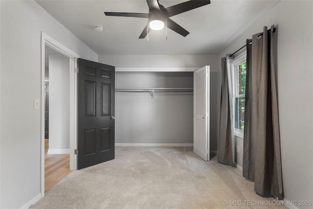 7532 E 55th Pl, Tulsa, OK 74145 - unfurnished bedroom with carpet, a closet, baseboards, and a ceiling fan