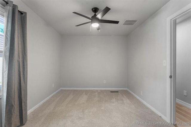 7532 E 55th Pl, Tulsa, OK 74145 - spare room featuring a ceiling fan, light carpet, and baseboards
