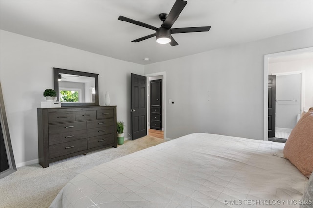 7532 E 55th Pl, Tulsa, OK 74145 - bedroom with light colored carpet and ceiling fan