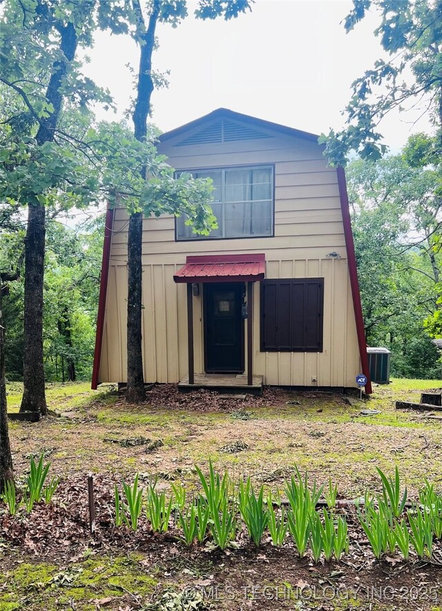95398 S 4556, Vian, OK 74962 - view of front of home with board and batten siding