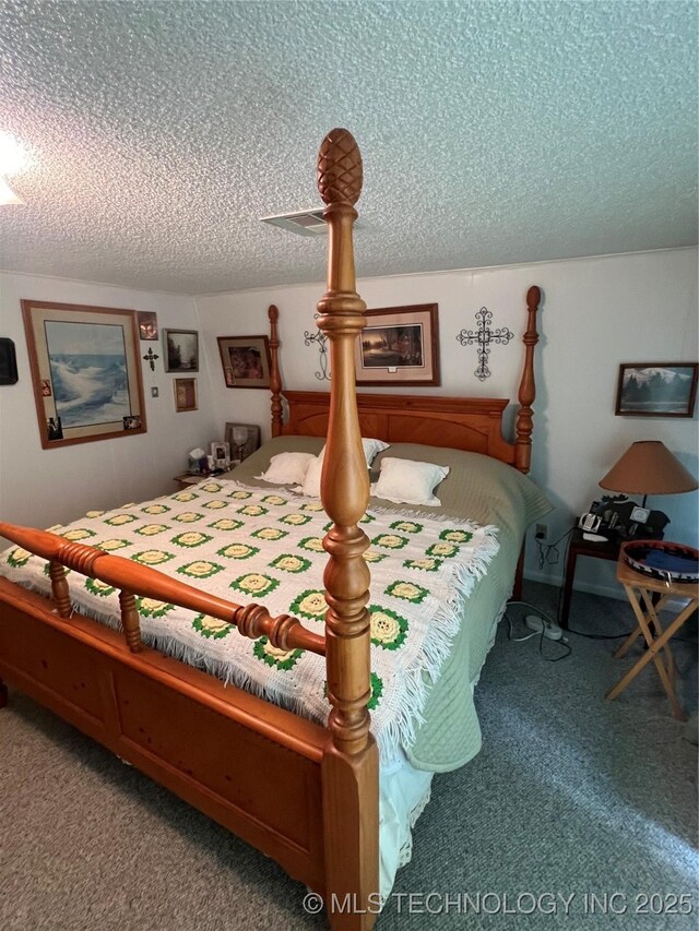 95398 S 4556, Vian, OK 74962 - carpeted bedroom featuring a textured ceiling