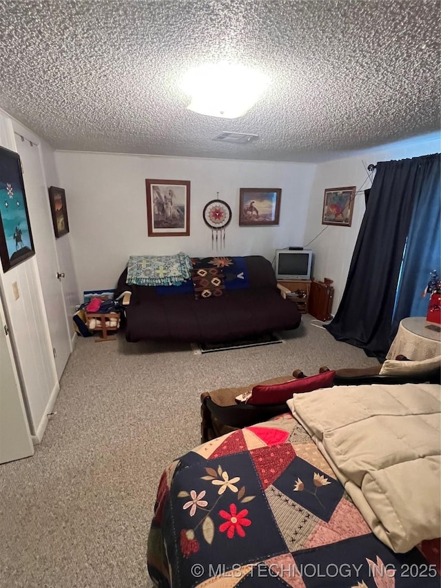 95398 S 4556, Vian, OK 74962 - carpeted bedroom featuring a textured ceiling