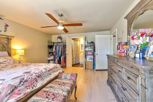 7008 S Hwy 28, Chelsea, OK 74016 - bedroom featuring light wood-style flooring and a ceiling fan