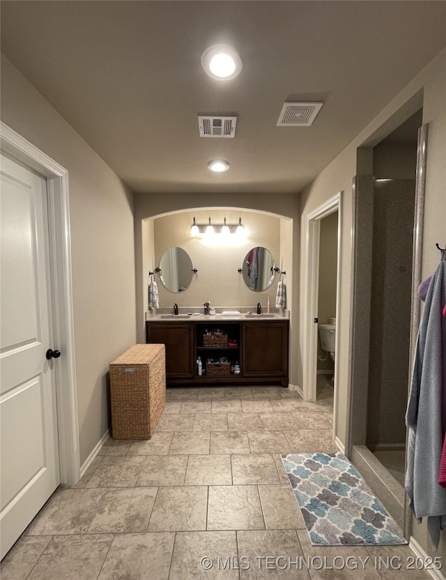 2613 W Van Buren Ct, Broken Arrow, OK 74011 - corridor with a sink, baseboards, and recessed lighting