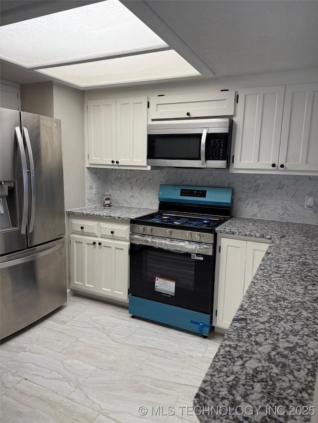2800 E Seattle St, Broken Arrow, OK 74014 - kitchen with stainless steel appliances, tasteful backsplash, stone countertops, white cabinets, and light marble finish floors
