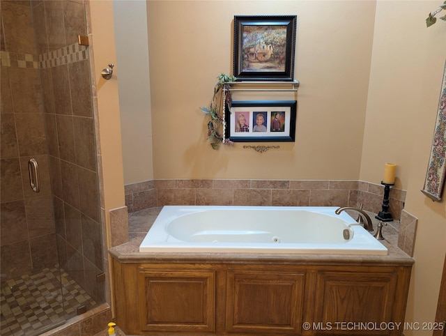 11309 S 107th E Ave, Bixby, OK 74008 - bathroom featuring a whirlpool tub and a shower stall