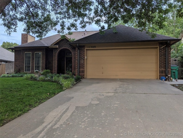 11309 S 107th E Ave, Bixby, OK 74008 - ranch-style house featuring brick siding, a garage, driveway, a chimney, and a shingled roof