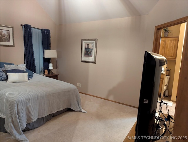 11309 S 107th E Ave, Bixby, OK 74008 - bedroom with vaulted ceiling, carpet flooring, and baseboards