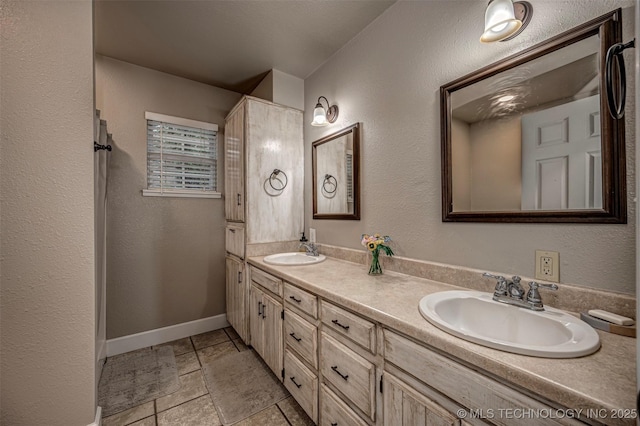 1319 SE 3rd St, Antlers, OK 74523 - full bath featuring double vanity, baseboards, and a textured wall