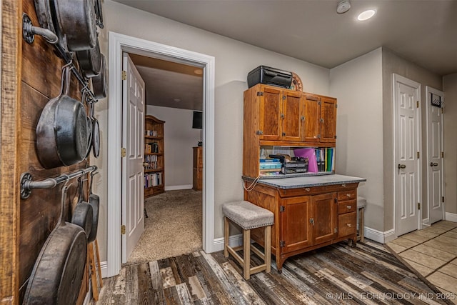 1319 SE 3rd St, Antlers, OK 74523 - hallway with dark wood-type flooring and baseboards