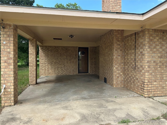 9871 E Windy Ln, Lane, OK 74555 - view of patio featuring a carport