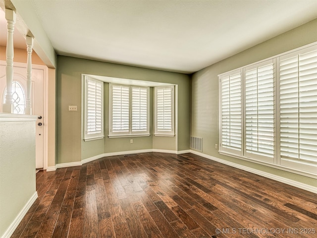406 Sequoyah Trl, Norman, OK 73071 - foyer entrance with hardwood / wood-style floors, healthy amount of natural light, and baseboards