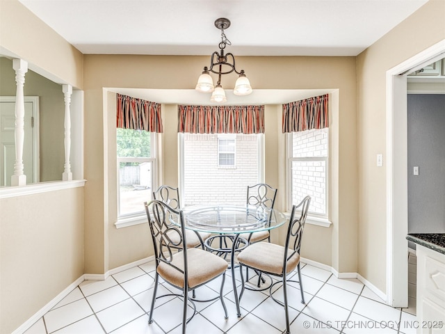406 Sequoyah Trl, Norman, OK 73071 - dining room with plenty of natural light, baseboards, light tile patterned floors, and a chandelier