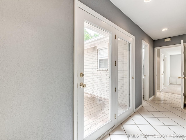 406 Sequoyah Trl, Norman, OK 73071 - doorway to outside with light tile patterned flooring, recessed lighting, and baseboards