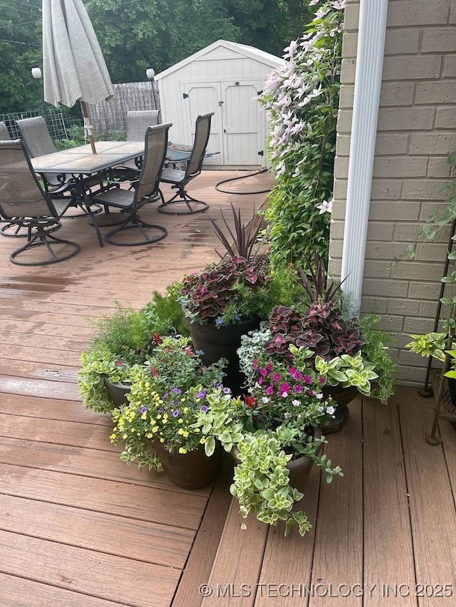 406 Sequoyah Trl, Norman, OK 73071 - wooden terrace with outdoor dining area