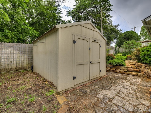 406 Sequoyah Trl, Norman, OK 73071 - view of shed with a fenced backyard