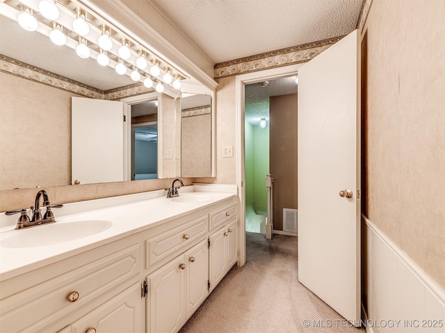406 Sequoyah Trl, Norman, OK 73071 - full bath featuring double vanity and a textured ceiling