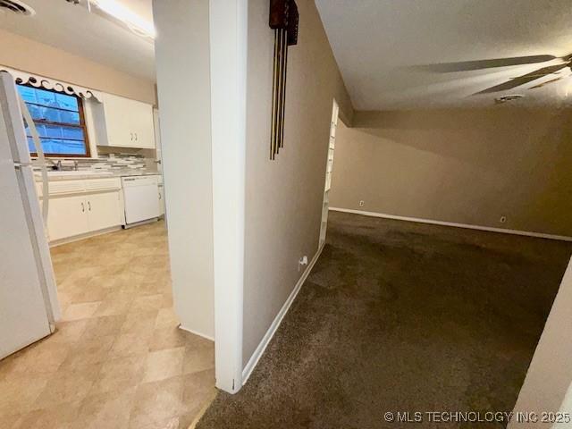 1714 E 11th St, Okmulgee, OK 74447 - corridor with baseboards