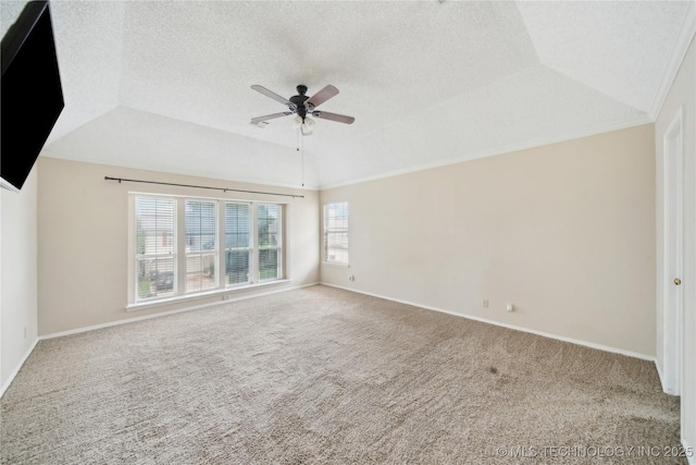 9306 S 94th E Ave, Tulsa, OK 74133 - spare room with carpet flooring, ceiling fan, a tray ceiling, baseboards, and ornamental molding
