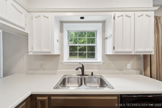 9306 S 94th E Ave, Tulsa, OK 74133 - kitchen with dishwasher, a sink, light countertops, and white cabinetry