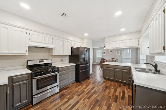 9306 S 94th E Ave, Tulsa, OK 74133 - kitchen featuring gas stove, refrigerator with ice dispenser, a sink, gray cabinets, and light countertops