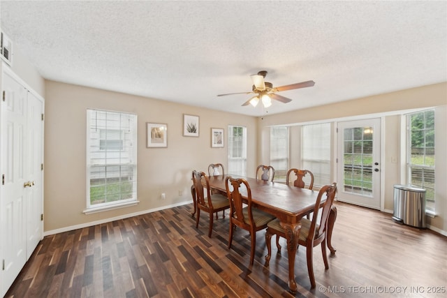 9306 S 94th E Ave, Tulsa, OK 74133 - dining room featuring dark wood-style flooring, ceiling fan, a textured ceiling, and baseboards