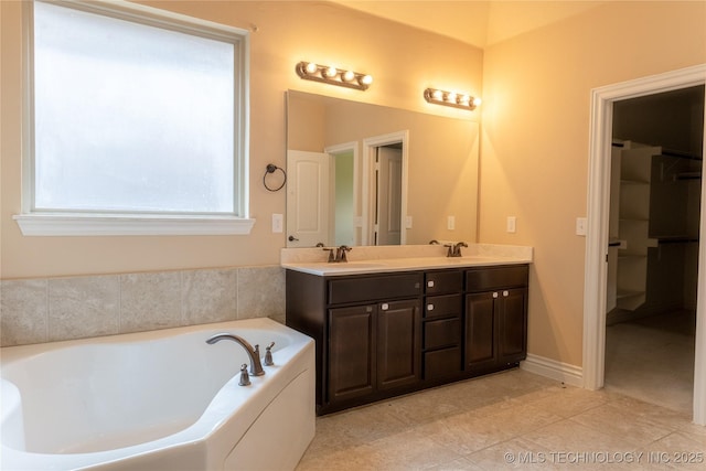 1425 Switchgrass, Edmond, OK 73013 - full bathroom featuring double vanity and a garden tub