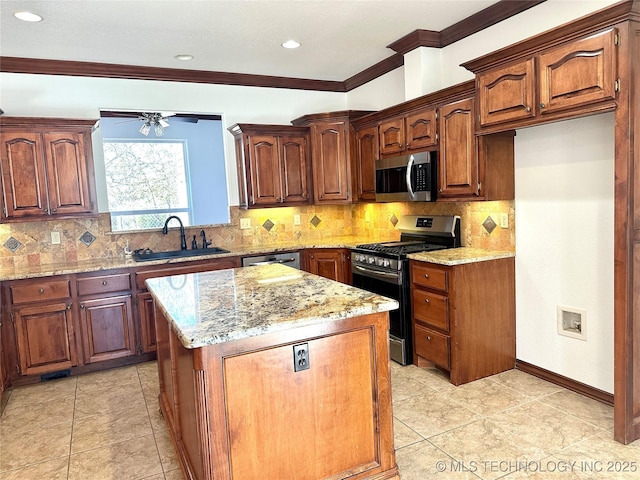 2013 State Highway 9a, Eufaula, OK 74432 - kitchen featuring stainless steel appliances, a sink, light stone counters, a center island, and a ceiling fan
