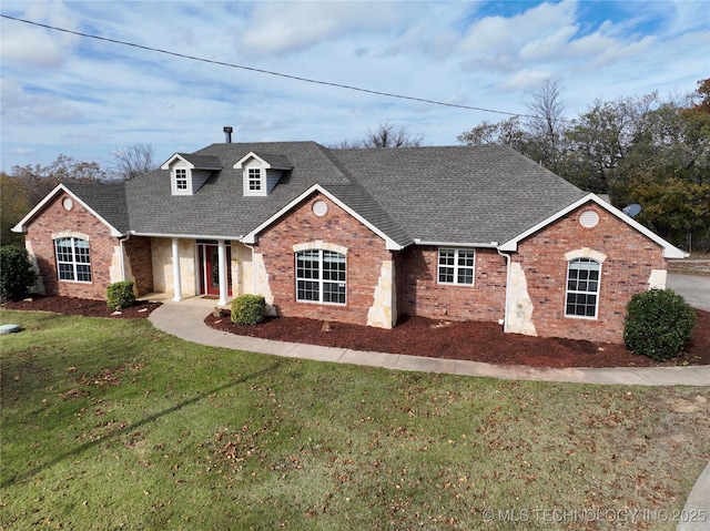 2013 State Highway 9a, Eufaula, OK 74432 - traditional-style home featuring brick siding, a shingled roof, and a front yard