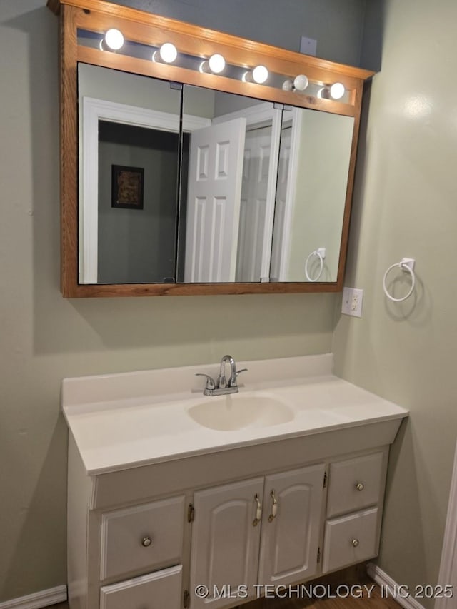 110534 S 4183rd Rd, Checotah, OK 74426 - bathroom with vanity and baseboards