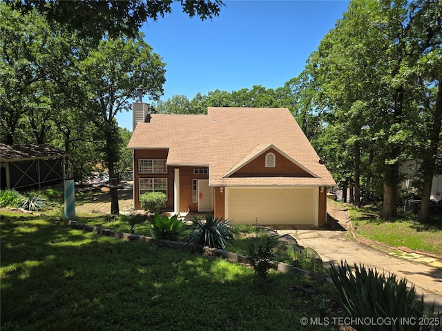 110534 S 4183rd Rd, Checotah, OK 74426 - view of front of house featuring a chimney, a garage, driveway, a front yard, and roof with shingles