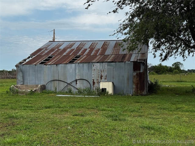 26230 Ash Rd, Boynton, OK 74422 - view of pole building featuring a lawn