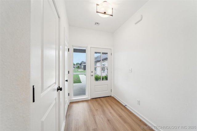 2504 W Birmingham St, Broken Arrow, OK 74011 - entryway with light wood-style floors and baseboards