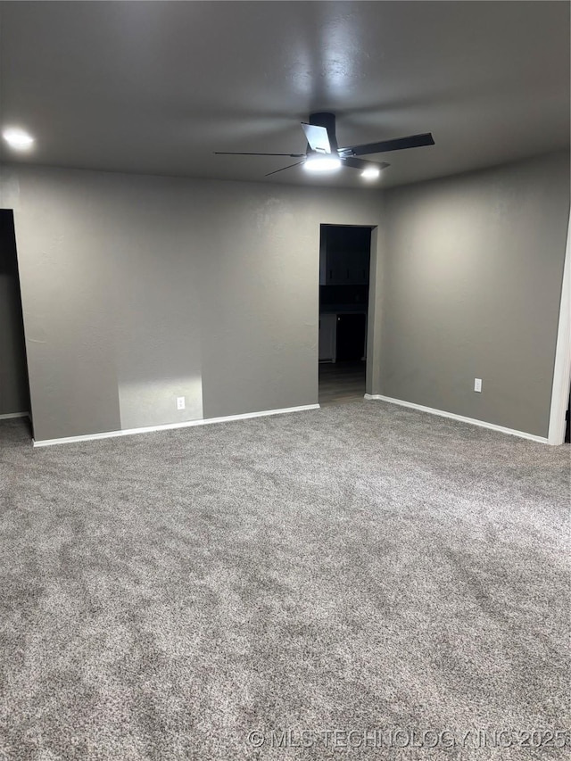413 E 8th St, Cushing, OK 74023 - spare room featuring ceiling fan, carpet flooring, and baseboards