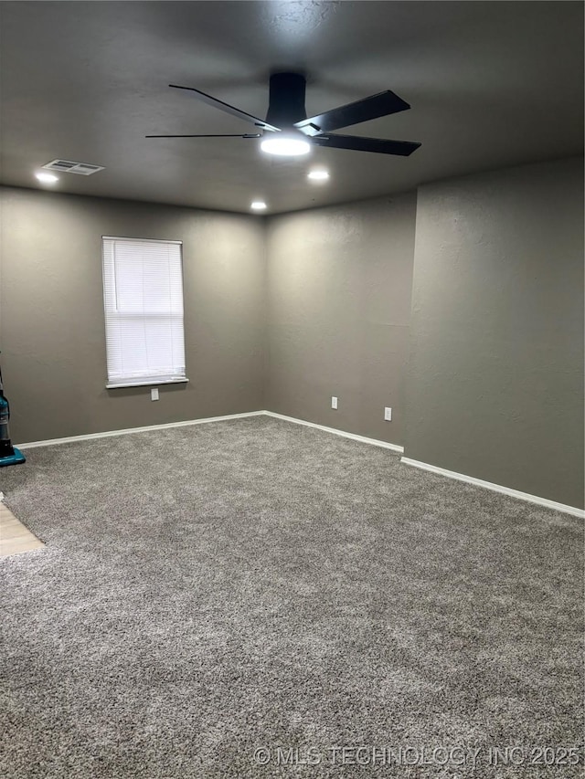 413 E 8th St, Cushing, OK 74023 - carpeted empty room featuring ceiling fan and baseboards