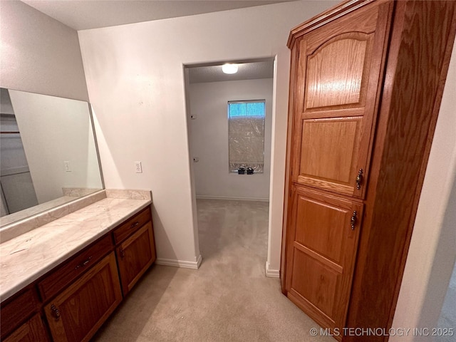 108 NW Division St, Red Oak, OK 74563 - bathroom featuring vanity and baseboards