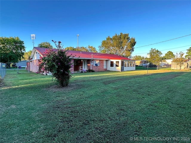 108 NW Division St, Red Oak, OK 74563 - rear view of property with metal roof