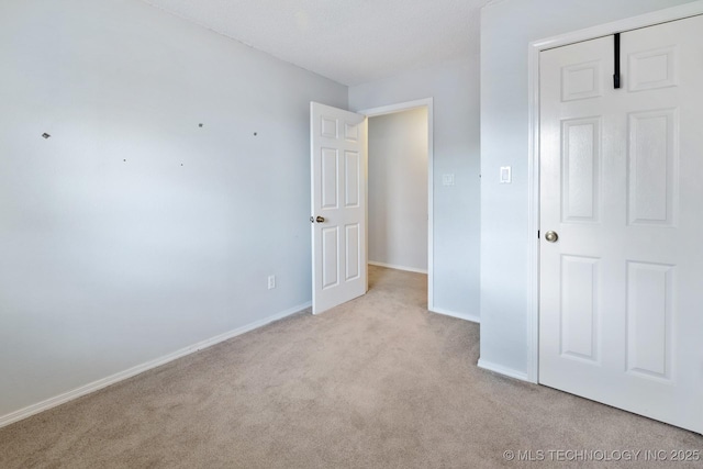 901 Christy, Calera, OK 74730 - unfurnished bedroom with light colored carpet and baseboards