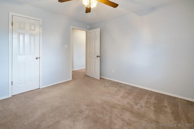 901 Christy, Calera, OK 74730 - unfurnished bedroom with carpet floors, baseboards, and ceiling fan