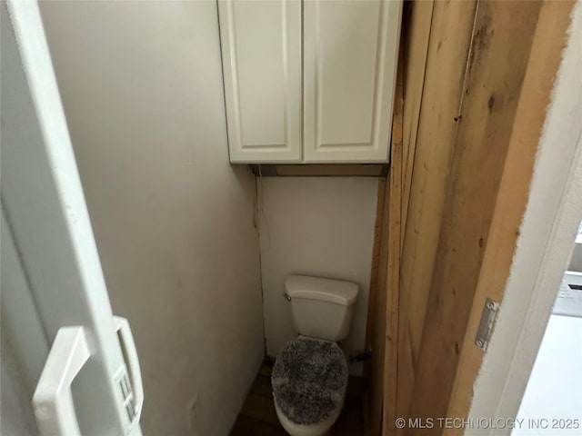 661 12th NW, Ardmore, OK 73401 - bathroom with toilet