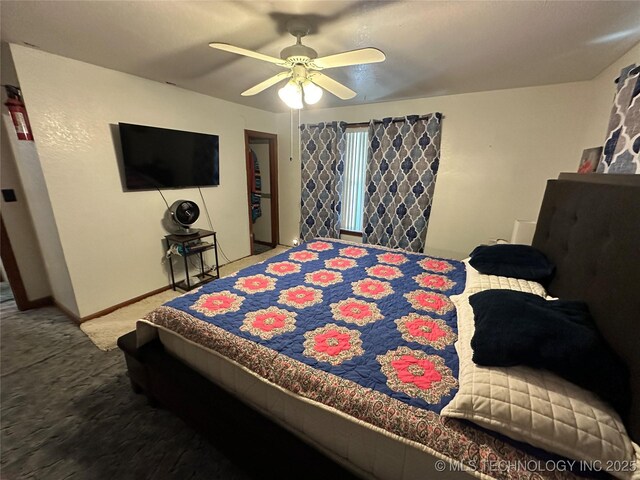 661 12th NW, Ardmore, OK 73401 - bedroom with carpet floors, baseboards, and ceiling fan