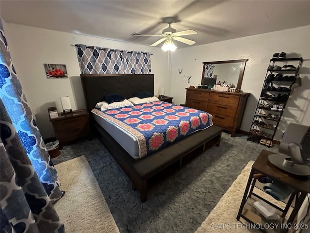 661 12th NW, Ardmore, OK 73401 - bedroom with carpet flooring and a ceiling fan
