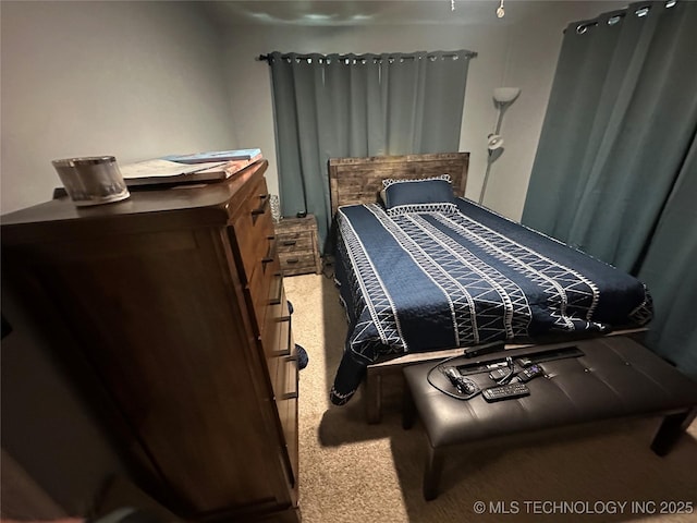661 12th NW, Ardmore, OK 73401 - bedroom featuring carpet