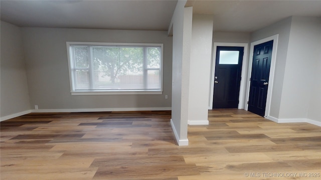420 W State, Stratford, OK 74872 - entrance foyer featuring healthy amount of natural light, baseboards, and light wood finished floors