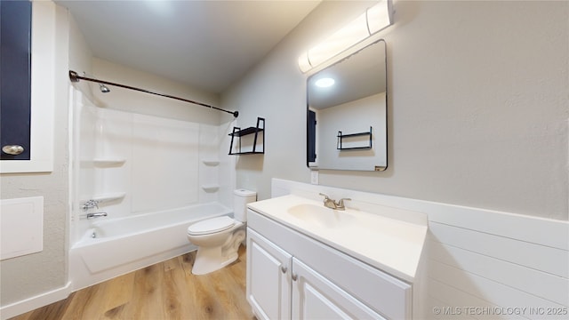 420 W State, Stratford, OK 74872 - full bath with vanity, wood finished floors, toilet, and tub / shower combination