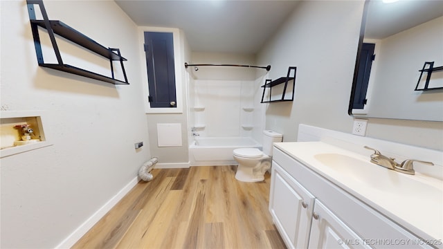 420 W State, Stratford, OK 74872 - full bath featuring vanity, wood finished floors, toilet, bathing tub / shower combination, and baseboards