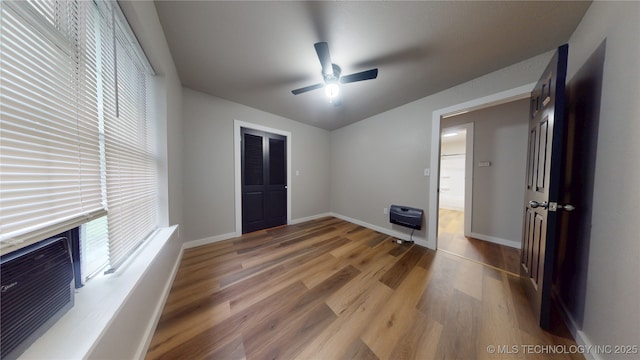 420 W State, Stratford, OK 74872 - unfurnished room with plenty of natural light, light wood-style floors, ceiling fan, and heating unit