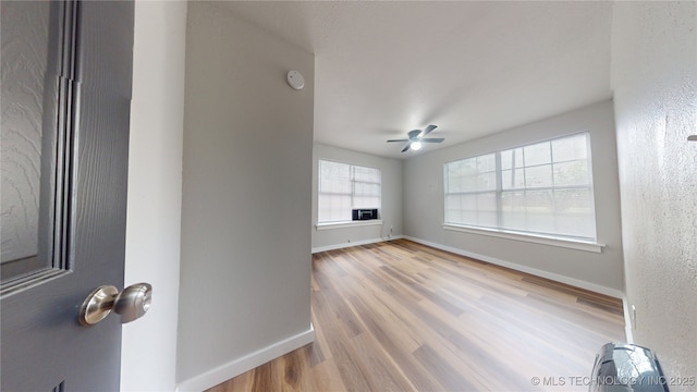420 W State, Stratford, OK 74872 - empty room featuring wood finished floors, baseboards, ceiling fan, and a smoke detector