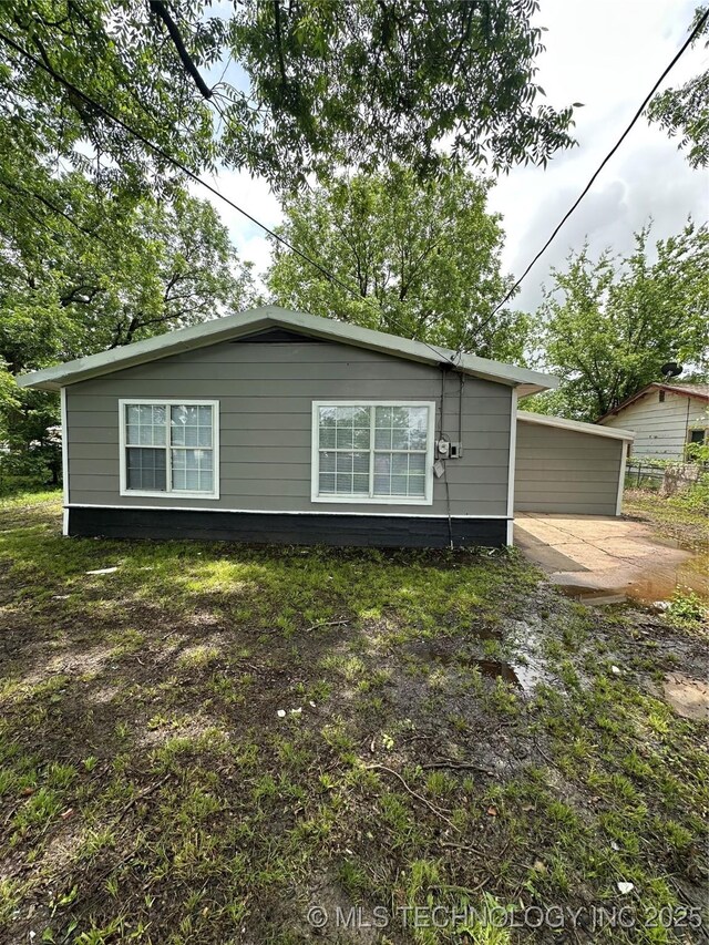 420 W State, Stratford, OK 74872 - back of property with a patio
