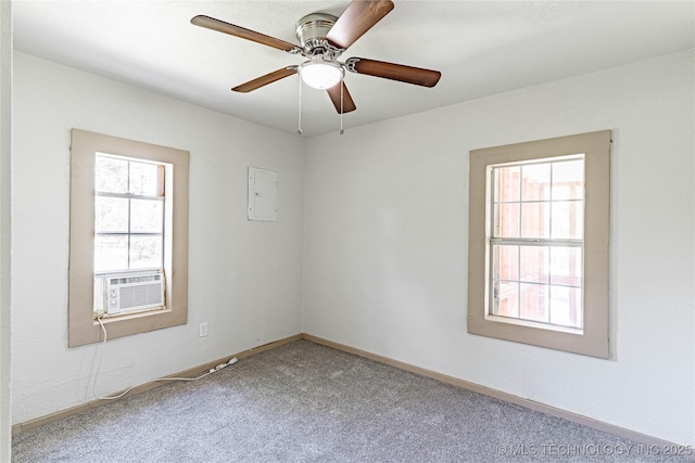 609 E Tejon Ave, Bristow, OK 74010 - carpeted spare room featuring cooling unit, a ceiling fan, and baseboards
